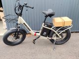 an image of a bicycle with a box strapped to the back