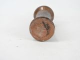 an image of a close up of a metal object on a white surface
