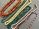 a close up of a bunch of beads on a table