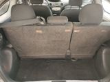 the back of a car with the seats folded down and the back seats folded down