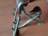 a gym equipment sitting on the floor in the room