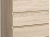 the chest of drawers is made of wood and has three drawers