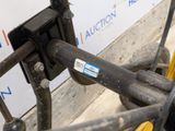 a close up view of a gas pump on the side of a building