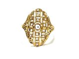 a close up of a gold ring on a white background