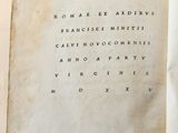 a book with writing on it sitting on a table