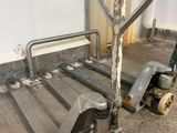 a hand truck that is sitting in a room