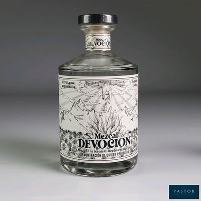 a bottle of alcohol that is sitting on a table
