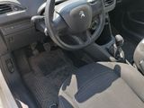 dashboard of a car with a steering wheel and a dash pad