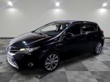 a picture of a black car parked in a garage