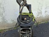a small machine that is sitting on the ground