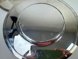 a person taking a picture of themselves in a mirror