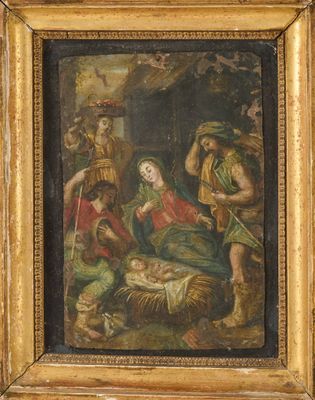 une peinture à l'huile représentant une crèche, dans un cadre doré