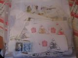 many different stamps in a plastic bag on a table