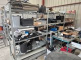 a room filled with lots of electronics and other items