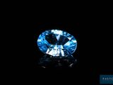 a blue diamond on a black background