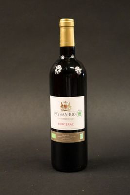 a bottle of wine that is sitting on a table