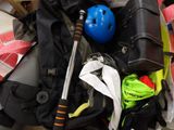 a blue helmet and a blue helmet on top of a backpack