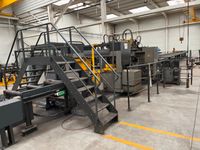 deux machines solidaires effectuant le sciage, la découpe et…