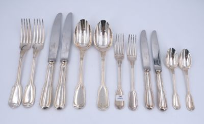 a lot of silverware on a table with a white background