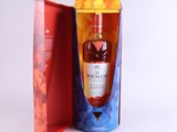 an image of a bottle of macallar ' s single malt whisky in a red box