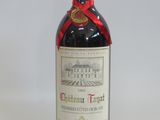 a bottle of wine that is sitting on a table