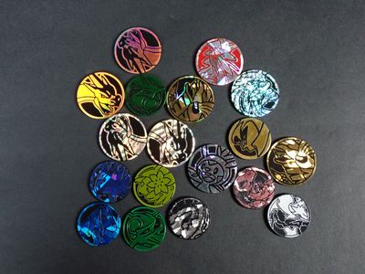 de nombreux boutons de différentes couleurs sur une surface noire