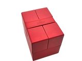 a red box with four pieces of paper on top of it