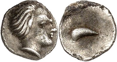 a silver coin with a man ' s face and a woman ' s face