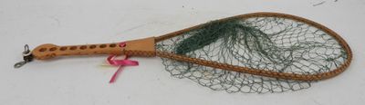 a tennis racket with a net attached to it