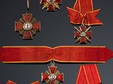 an image of a group of medals and ribbons on a black background