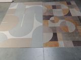a picture of a room with a rug on the floor