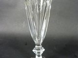 a glass vase that is sitting on a table