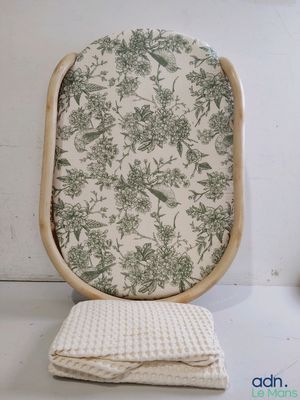 a picture of a chair with a cushion on it