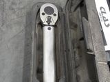 a tool in a case that is sitting on the floor