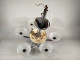 a chandelier made of glass and a metal holder