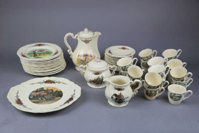 many plates and cups that are sitting on a table