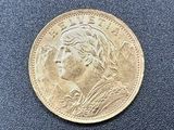 une pièce d'or portant un visage de femme