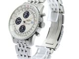 a close up of a watch on a white background