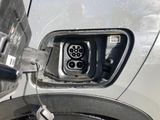 an electric car plugged into a charging station