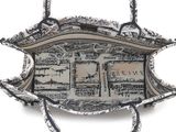 an image of a silver purse with a map on it