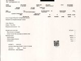 un gros plan d'un document sur lequel figure un carré noir