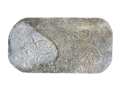 an image of a rock with a picture of a man on it