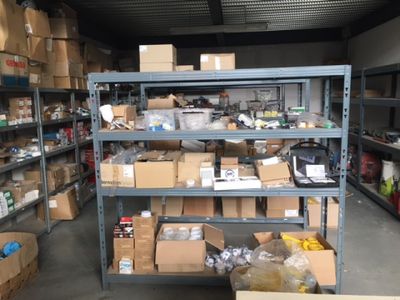 many boxes and boxes on the shelves in the warehouse