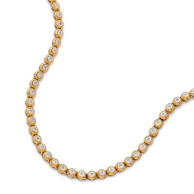un ensemble composé d'un collier et d'un bracelet sertis de diamants, en or jaune 18 carats