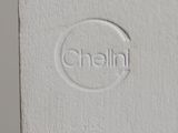 a close up of a white door with a logo on it