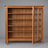 Grande vitrine bibliothèque en bois naturel mouluré, ouvrant… (photo 2)