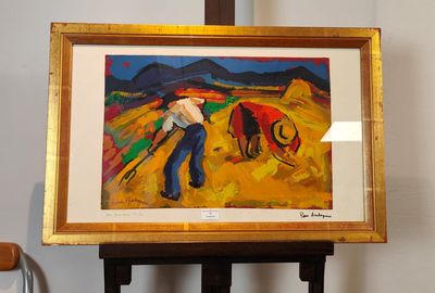 un tableau représentant un homme labourant un champ avec un cheval