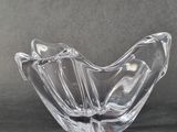 a glass bowl that is sitting on a table