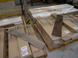 a lot of boxes of wood on a pallet in a warehouse