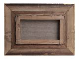 an old wooden picture frame with a picture hanging on it